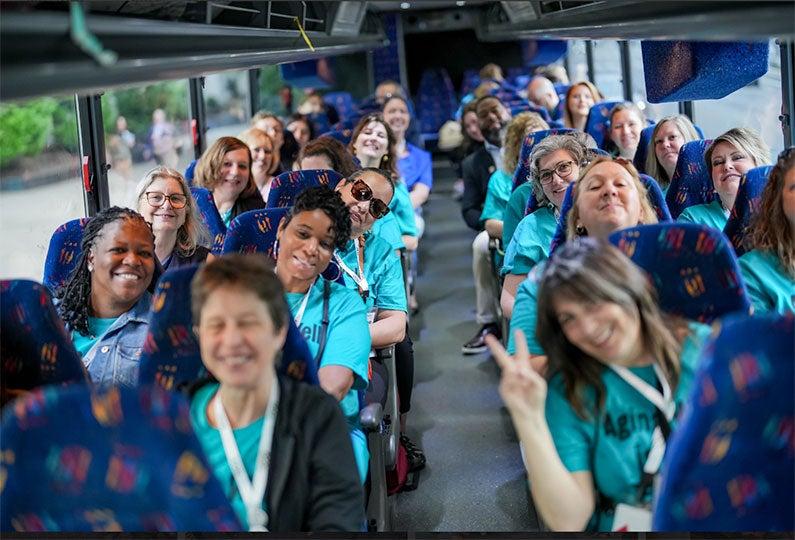 Hill Day participants on bus to Capitol