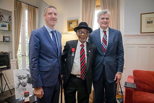Senator Bill Cassidy with two men