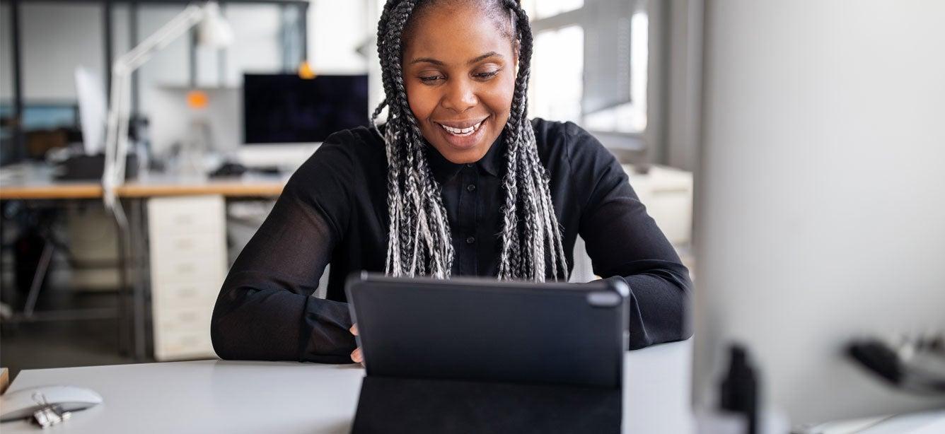 Older African American woman on work video call