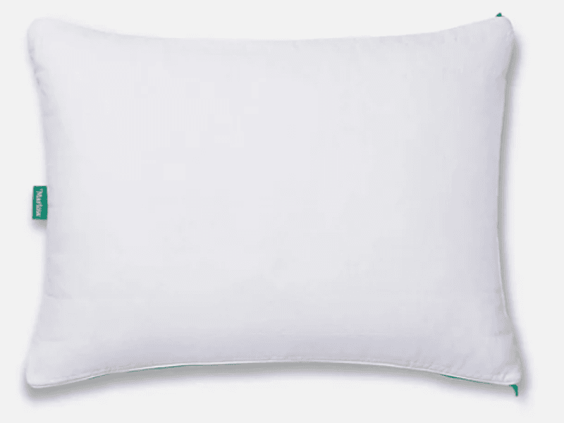 White rectangular pillow with visible zipper and green tag reading ‘Marlow.’.