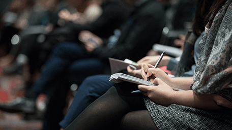 reporters taking notes