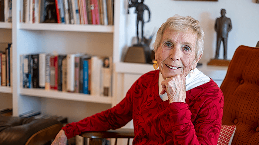 Smiling older woman in easy chair