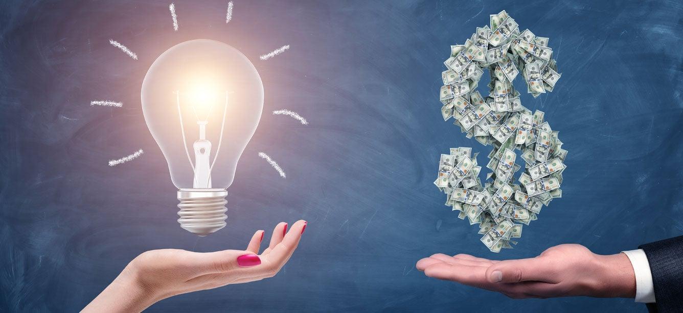 An illustration of a woman's hand with a light bulb hovering over it on the left, and a man's hand with a dollar symbol made out of dollar bills hovering over it.