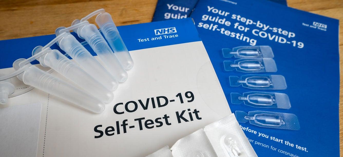 A close up shot of a COVID-19 at-home test.