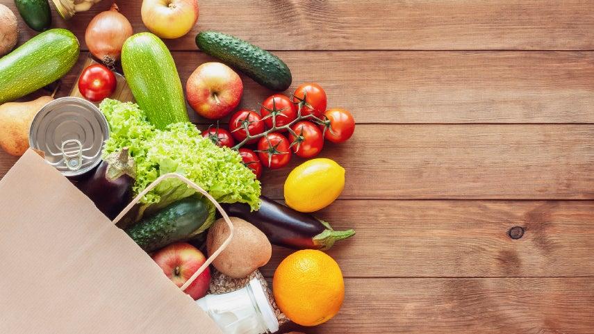 Bag of fresh produce on a table.