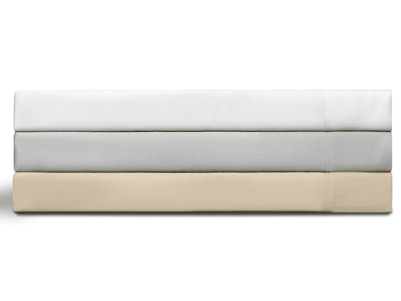 White, grey, and tan Bear Tencel sheets folded and stacked
