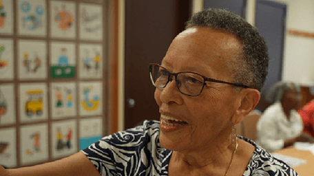smiling older woman at senior center