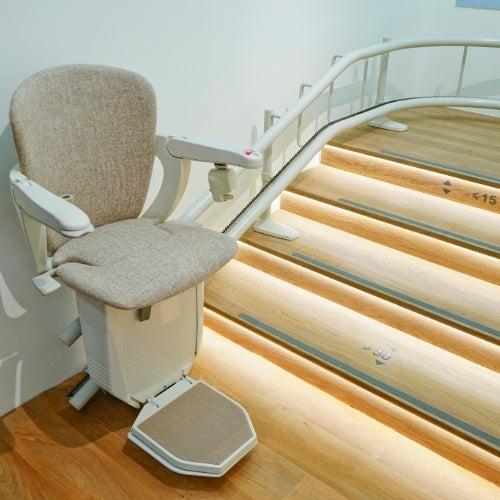Bruno stair lift in showroom with lighted floors